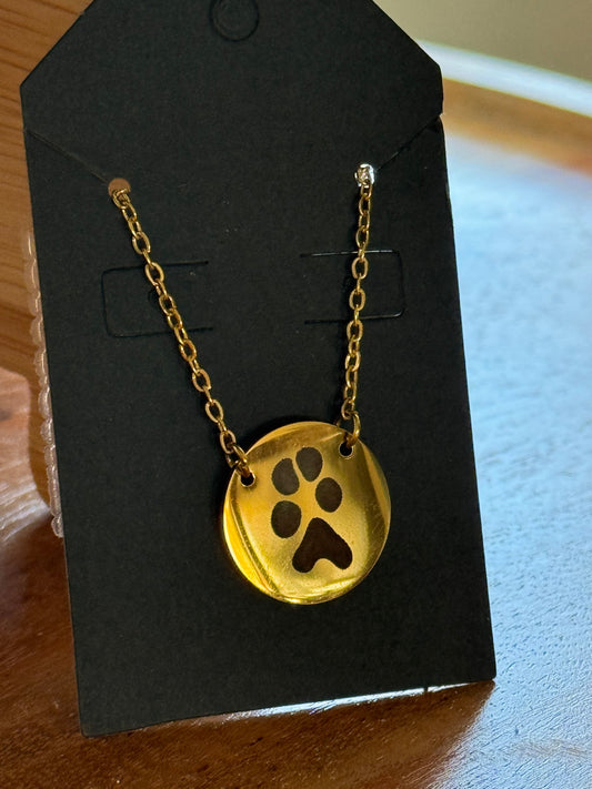 Gold paw print necklace option in the Heirloom package