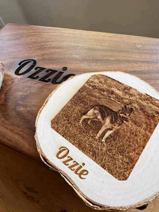 Natural wood slice portrait engraved with a dog named Ozzie